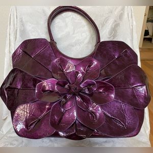 Beautiful purple patent bag.  15”W x 13”Tx 5”D. Excellent condition